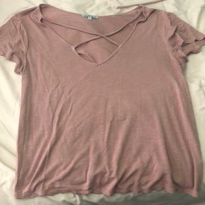 Cute pink T-shirt with crisscross design